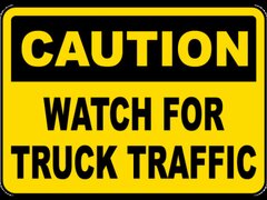 Caution Watch For Truck Traffic Sign